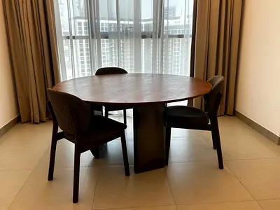 Solid Wood Round Dining Table with 4 Upholstered Chairs - Good Condition