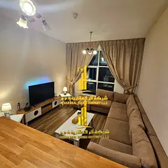 Luxury one-bedroom apartment with a living room and open balcony. Ajman City Tower. Fully furnished,