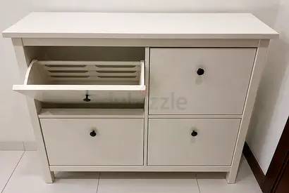 IKEA white shoe cabinet with 4 flip-down compartments