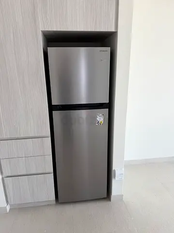 Silver two-door refrigerator in good condition