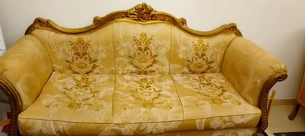 Classic gold-upholstered 5 seater sofa with carved wooden frame