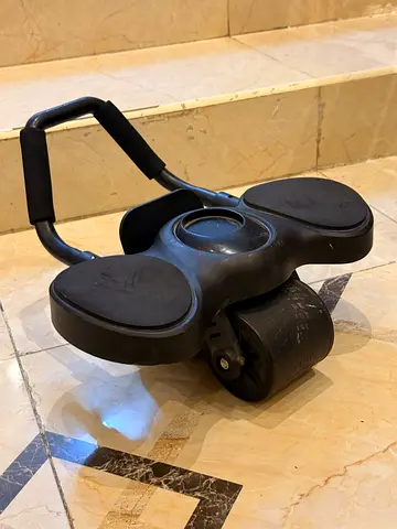 Ab roller core trainer with dual wheels — used