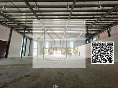 مستودع ثقيل التحمل يوفر قدرة كهربائية 200 كيلوواط ومساحة 13,500 قدم مربع وموقع مميز على شارع رئيسي.