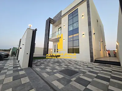 Luxury villa, first occupancy, for annual rent in Ajman - Al Zahiyah - two floors and a roof, 5 bedrooms, 2 living rooms, a majlis and a maid's room