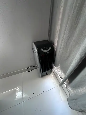 Portable evaporative air cooler - compact unit, good condition
