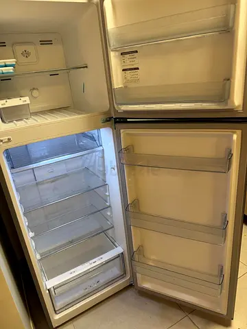 Relocaton SALE. Used top-freezer refrigerator in good working condition