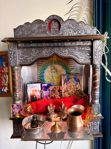 Traditional Indian Silver-Tone Pooja Mandir with Deity Idols and Accessories