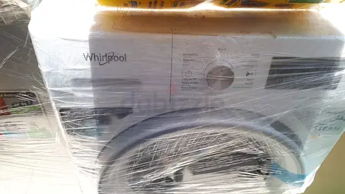 Whirlpool front-load washing machine - good condition, wrapped for transport