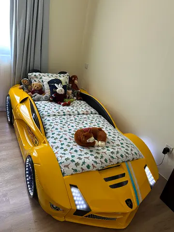 Sports Car Bed with Mattress and working lights on tires and headlights. With remote.