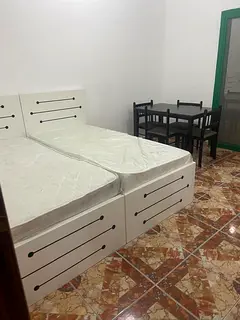 Room available in Abushaghara near city retail supermarket  .balcony and separate washroom .