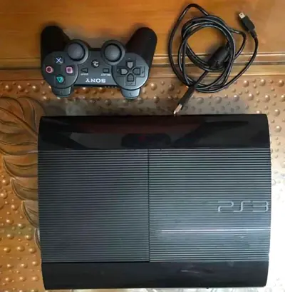Sony PlayStation 3 Slim console with controller and cables - good working condition