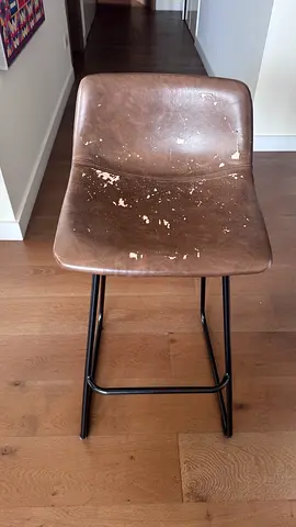 Used brown leather-look bar stool with metal legs - some wear. Set of 4 available. All 4 for 200 AED