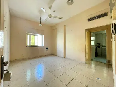 VERY SPECIOUS 1 BHK ON ROAD BUILDING MUWALIEH SHRAJAH