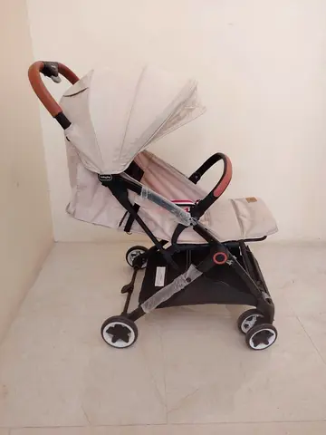 Lightweight Beige Compact Baby Stroller - Good Condition