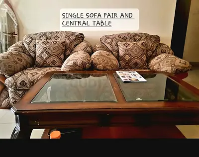 7 Seater Sofa Pair with Central Glass-top Table. Highly durable. Price negotiable