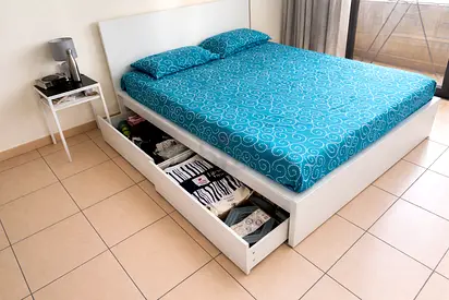 IKEA Malm Queen bed with built-in storage drawers (good condition)