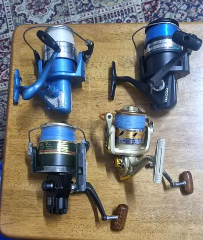Set of 4 Used Fishing Spinning Reels - Ready to Fish