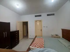 Furnished room for rent for family or for two executive bachelors in Madinatzayed.