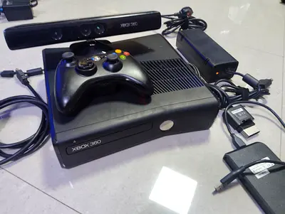 Xbox 360 with Kinect and loaded 120 games.