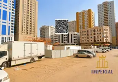 Residential and commercial plot on the corner of two streets (G+15), freehold, third plot from Kuwai