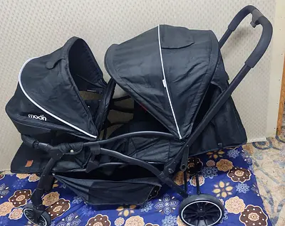 Moon dois Double Stroller 150 aed