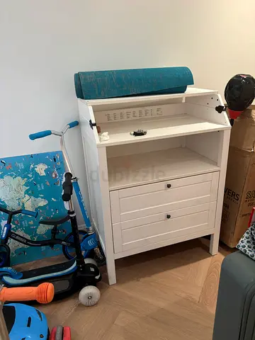 White IKEA changing table with drawer and shelf — good condition