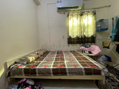 Simple wooden double bed frame with mattress - good condition