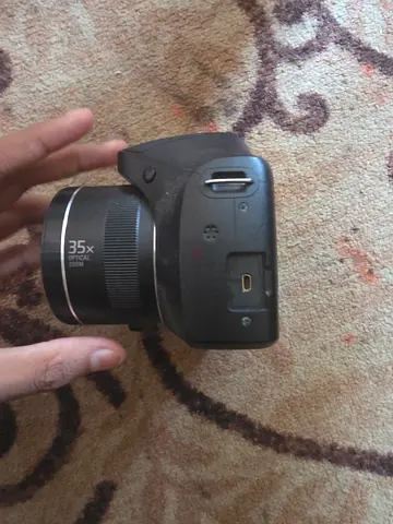 Compact digital camera with 35x optical zoom - used