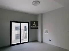 For annual rent in Ajman, Kentia, first occupancy, two bedrooms, living room, and three bathrooms