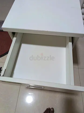 White bedside nightstand with drawer