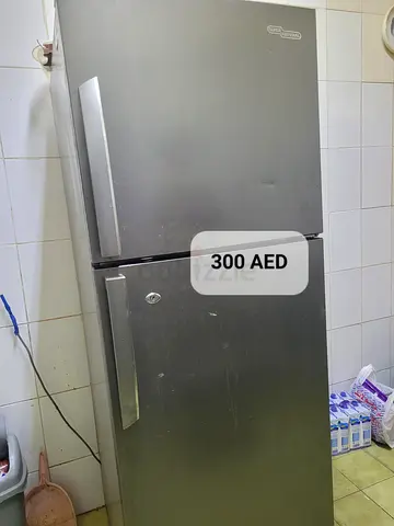 Used double-door refrigerator - good working condition, 300 AED