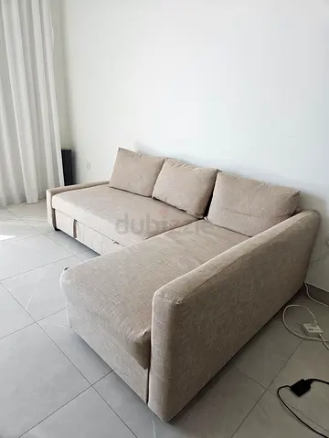 Ikdea light beige L-shaped sectional sofa - pull out bed convertible