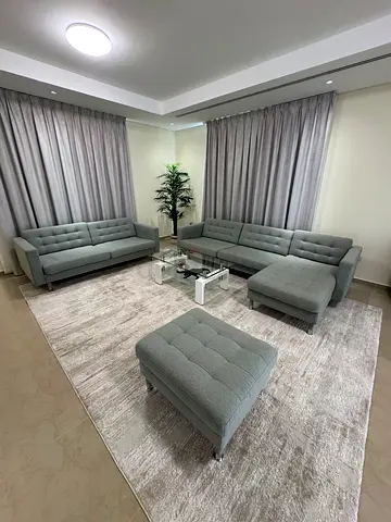Living room Ikea sofas (3 seater + 2 seater +1) and center glass coffee table