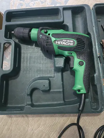 Hitachi corded electric drill with case - used
