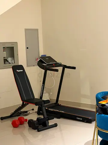 Foldable Treadmill with Adjustable Bench and Free Weights - Good Condition