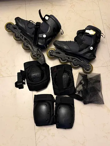 Mens inline rollerblades with protective pads - size approx. EU 42 (used)