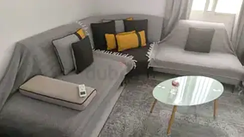 3-piece Grey Corner Sofa Set with Cushions and Glass Coffee Table