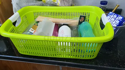 Plastic Storage Basket with Various Kitchen Items