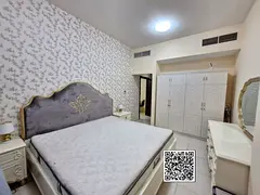 A furnished and elegantly arranged one-bedroom apartment with two bathrooms.