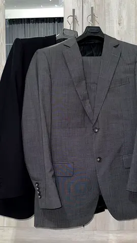 Mens 2 suit set grey and black- good condition, size 48 L (US/UK) with protective suit cover