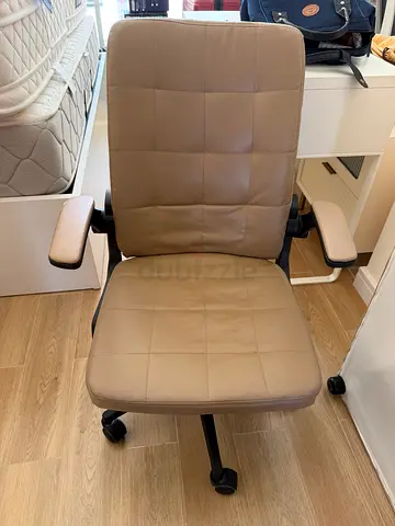 Beige Padded Office Chair with Wheels - Good Condition