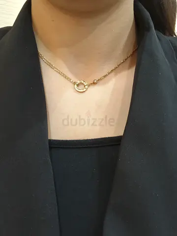 Gold Cartier-style necklace with circular pendant (pre-owned)