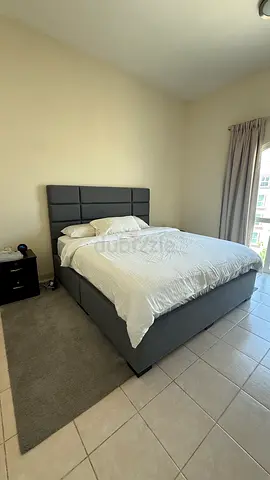 Grey upholstered King Bed + Deluxe Mattress - Very Good Condition