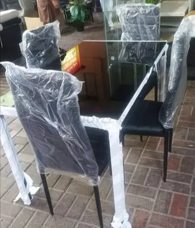 Glass Top Dining Table with 4 Upholstered Chairs - Near New