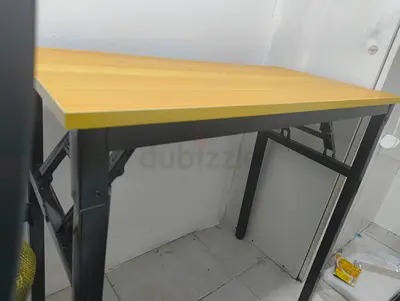 Simple folding study table with wood top and metal legs