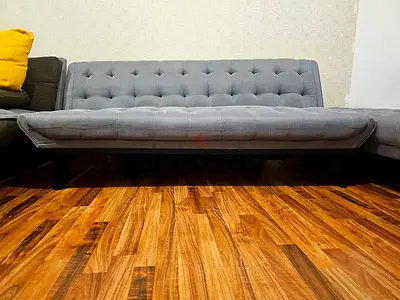 Grey tufted sofa bed - converts to lounger, above average condition