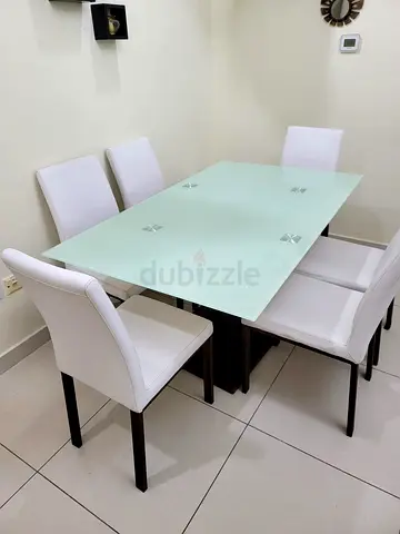Glass table with 6 chairs