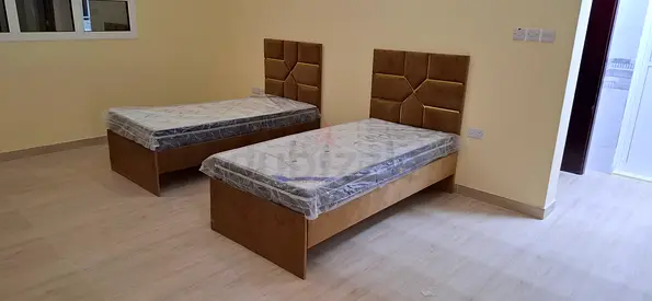 Pair of single beds with new mattresses - good quality