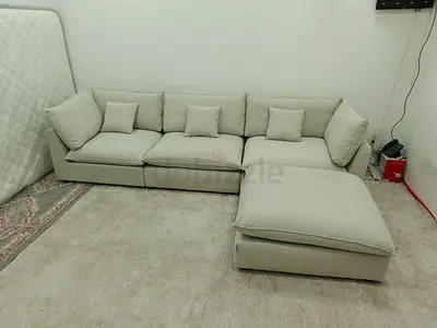 Expensive quality comfortable modular sofa with ottoman