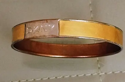 DKNY womens enamel bangle bracelet, gold-tone, good condition